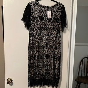 Woman’s lined lace black dress.  Size xl
